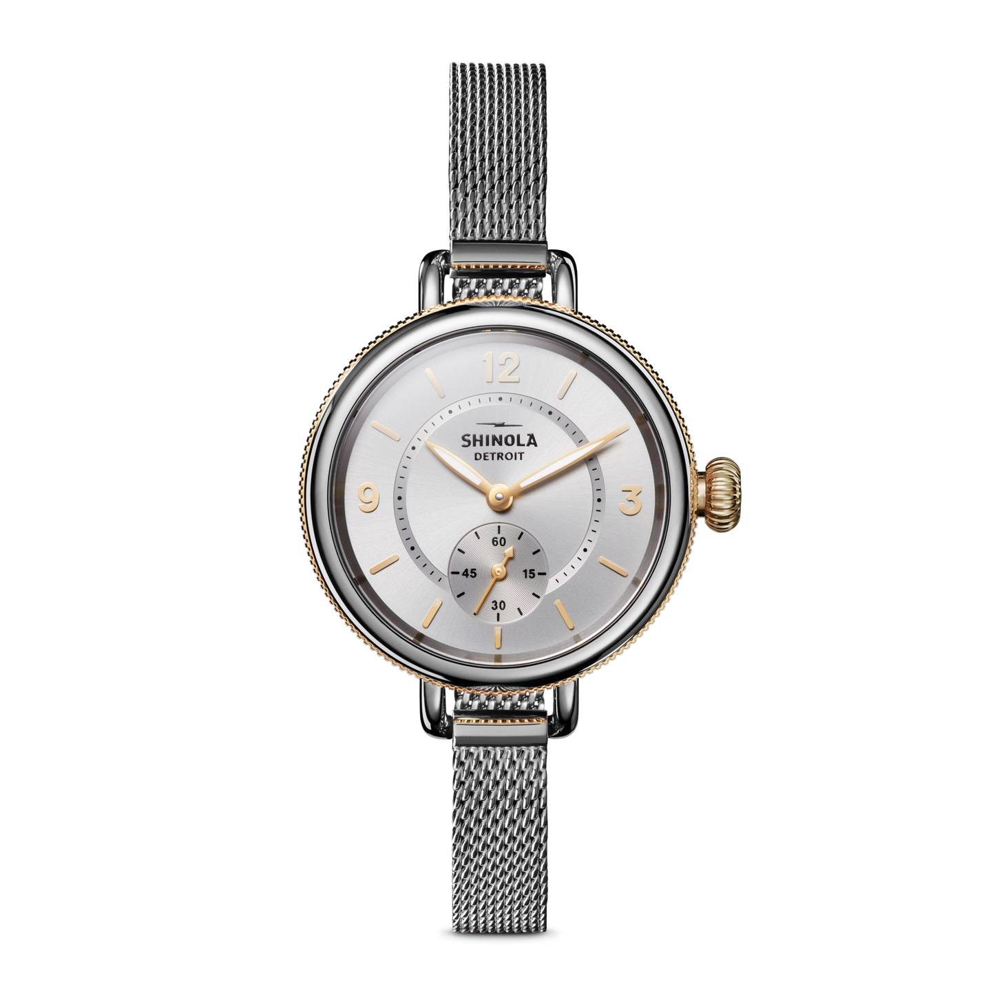 The Birdy Watch - Silver by Shinola features a mesh band, gold accents, a round face with gold hour markers, subdial at 6 o'clock, and a ridged crown on the right side.