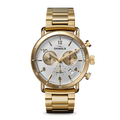 The Shinola Canfield Sport Watch - Gold Dominos features a gold chronograph case, silver dial with gold accents, two subdials, date window, and a gold metal link band, displayed against a plain white background.