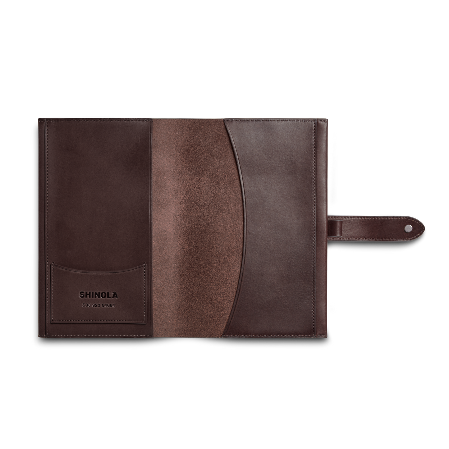 A dark brown Vachetta leather Medium Snap Journal Cover by Shinola is open, revealing multiple inner compartments, a strap closure, and an interior with subtle texture and color contrast. "Shinola" is embossed on the left pocket.