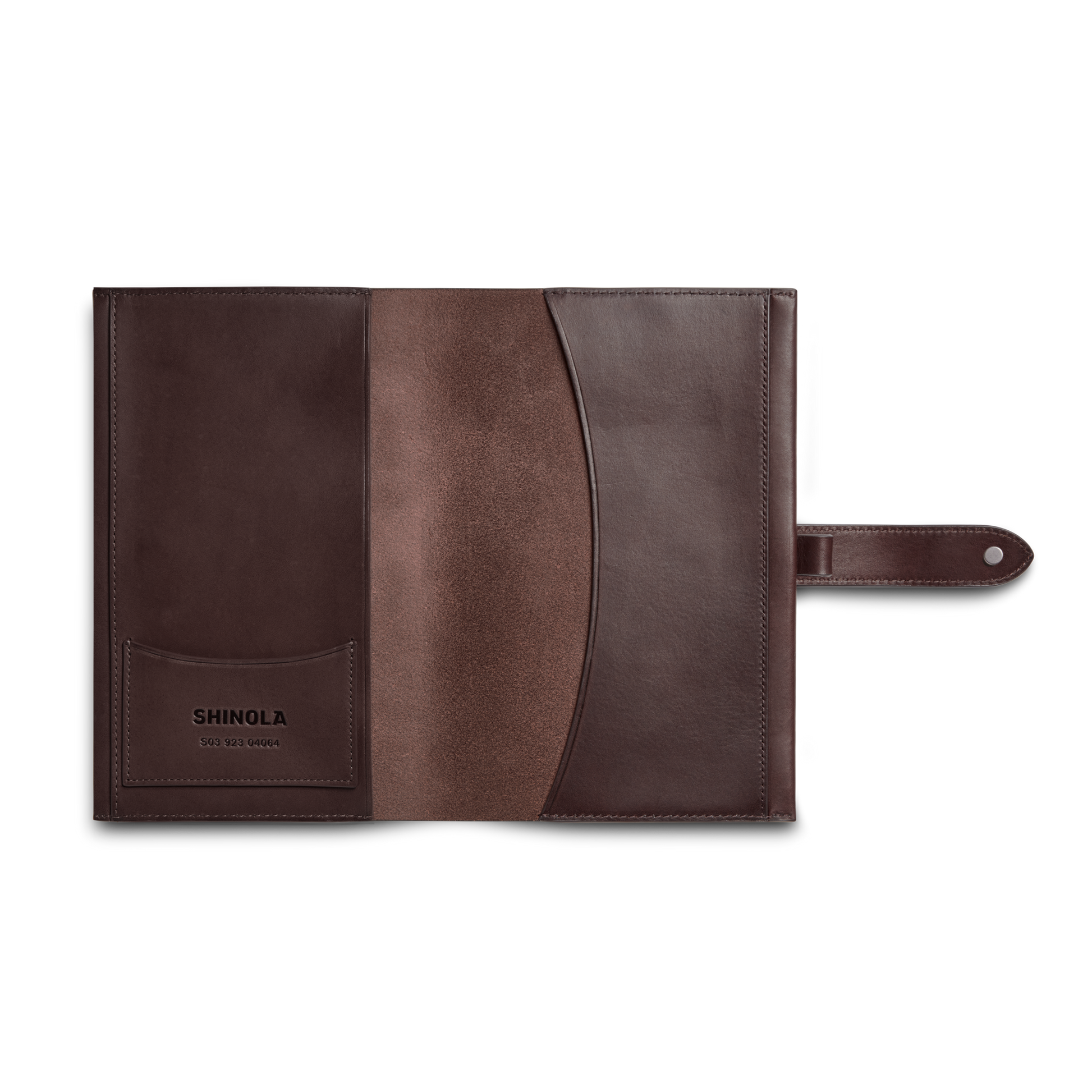 A dark brown Vachetta leather Medium Snap Journal Cover by Shinola is open, revealing multiple inner compartments, a strap closure, and an interior with subtle texture and color contrast. "Shinola" is embossed on the left pocket.