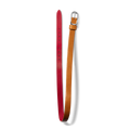The Shinola Strap: 10/10 Smooth Essex/Montana, StchdFlip, RvsblOval,PoSS - Bourbon / Blush is a leather belt with a silver buckle, tan (bourbon) outer and red (blush) inner sides, shown on a light gray background.