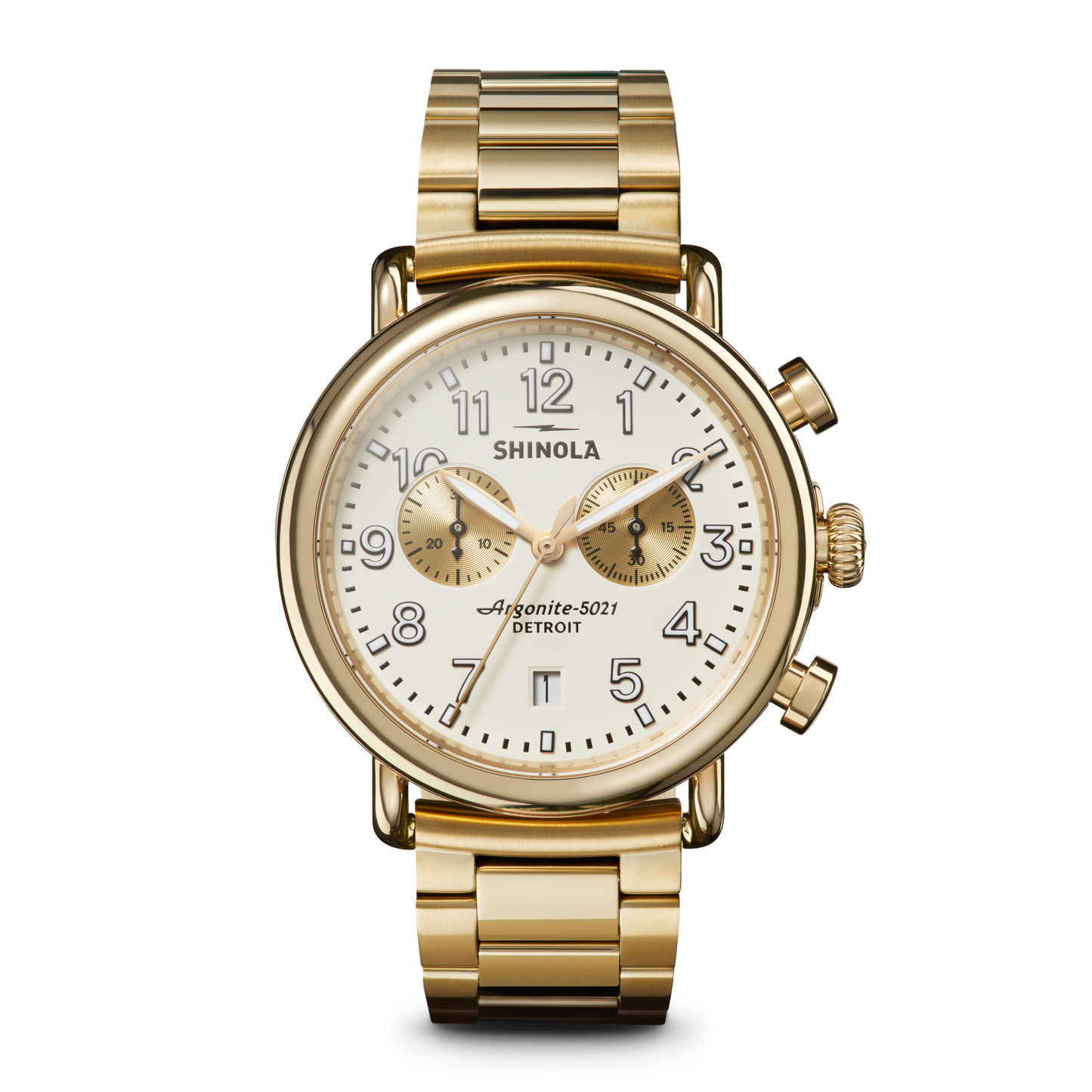 The Shinola Runwell Chronograph Watch - Ivory features a gold-tone case, ivory dial with gold markers and hands, two subdials, a date window at 6 o’clock, and a gold stainless steel bracelet, shown on a plain white background.