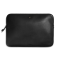 The Shinola Laptop Tech Case - Dominos is a black leather sleeve with a minimal design, featuring a small embossed logo and two gold dots near the top, shown on a plain white background—a sleek way to organize your devices.