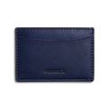 A navy blue Leather 3 Pocket Card Case - Lake by Shinola, featuring a curved top slot and the brand name embossed on the front, photographed against a white background.