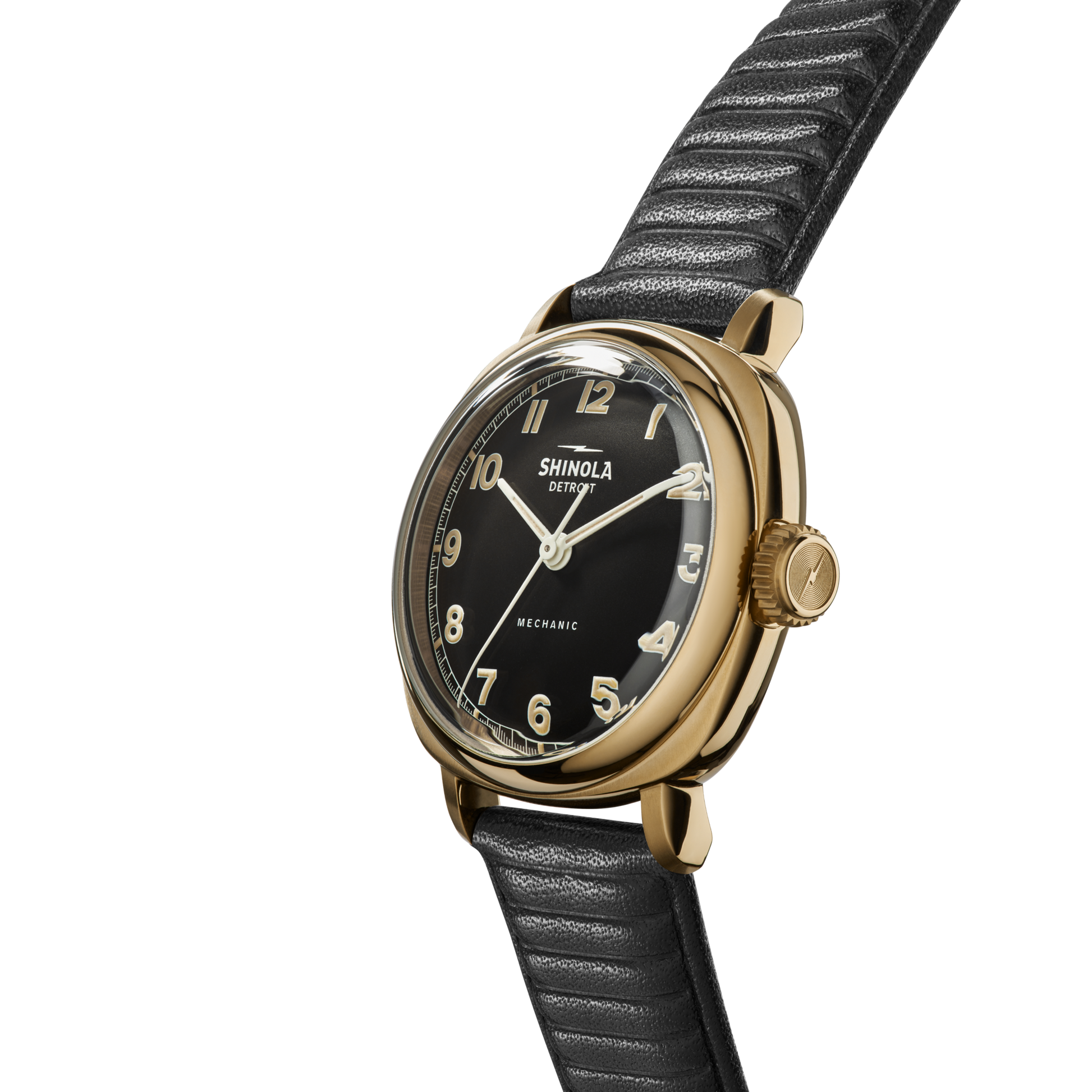 The Shinola Mechanic Watch - Dominos features a black leather strap, gold case, black dial with gold numerals, and the word MECHANIC on the face. This hand-wound timepiece is shown angled on a white background.