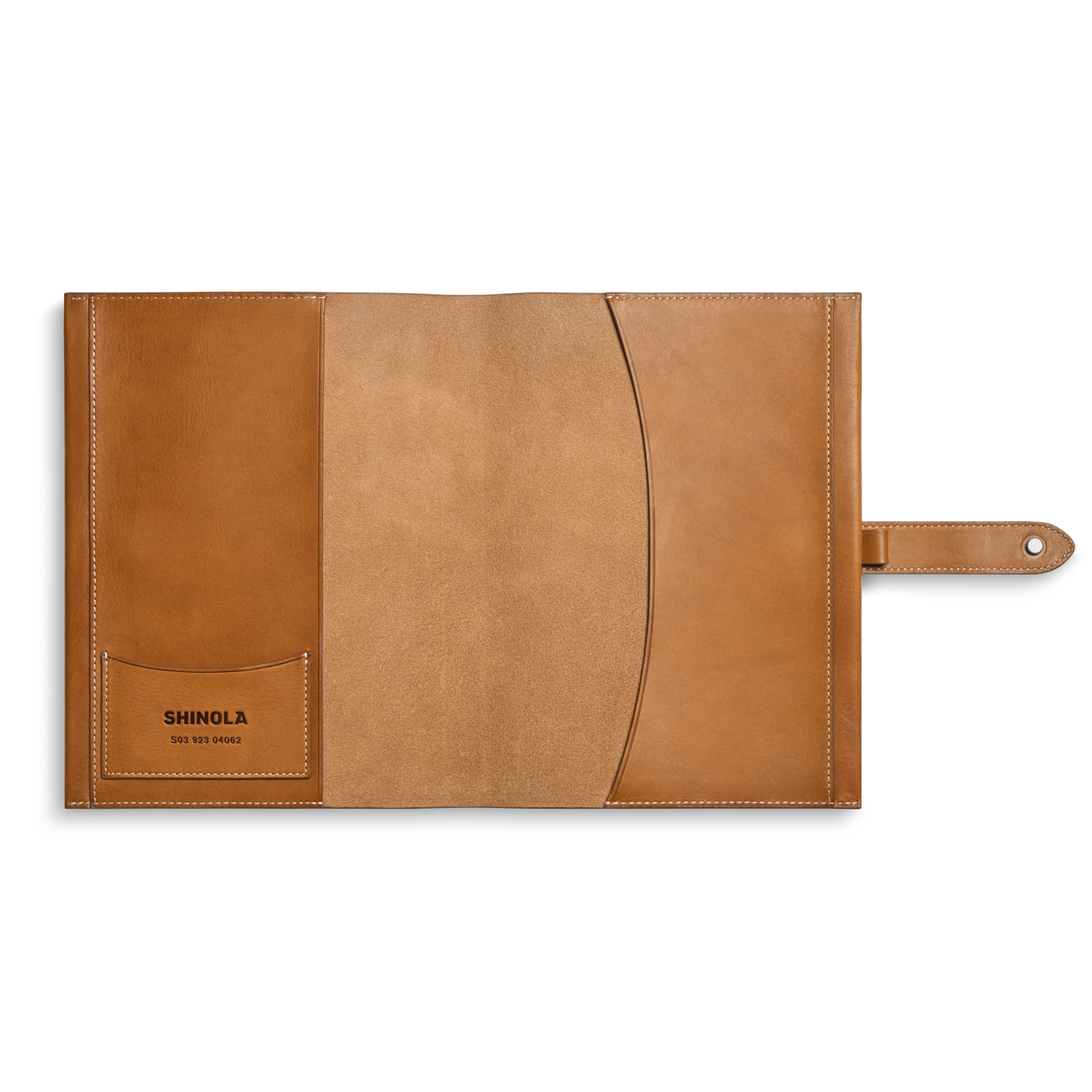 The Shinola Large Journal Cover in tan Italian Vachetta leather features multiple pockets, an open design with a snap tab closure, and the left pocket is embossed with SHINOLA and additional text.