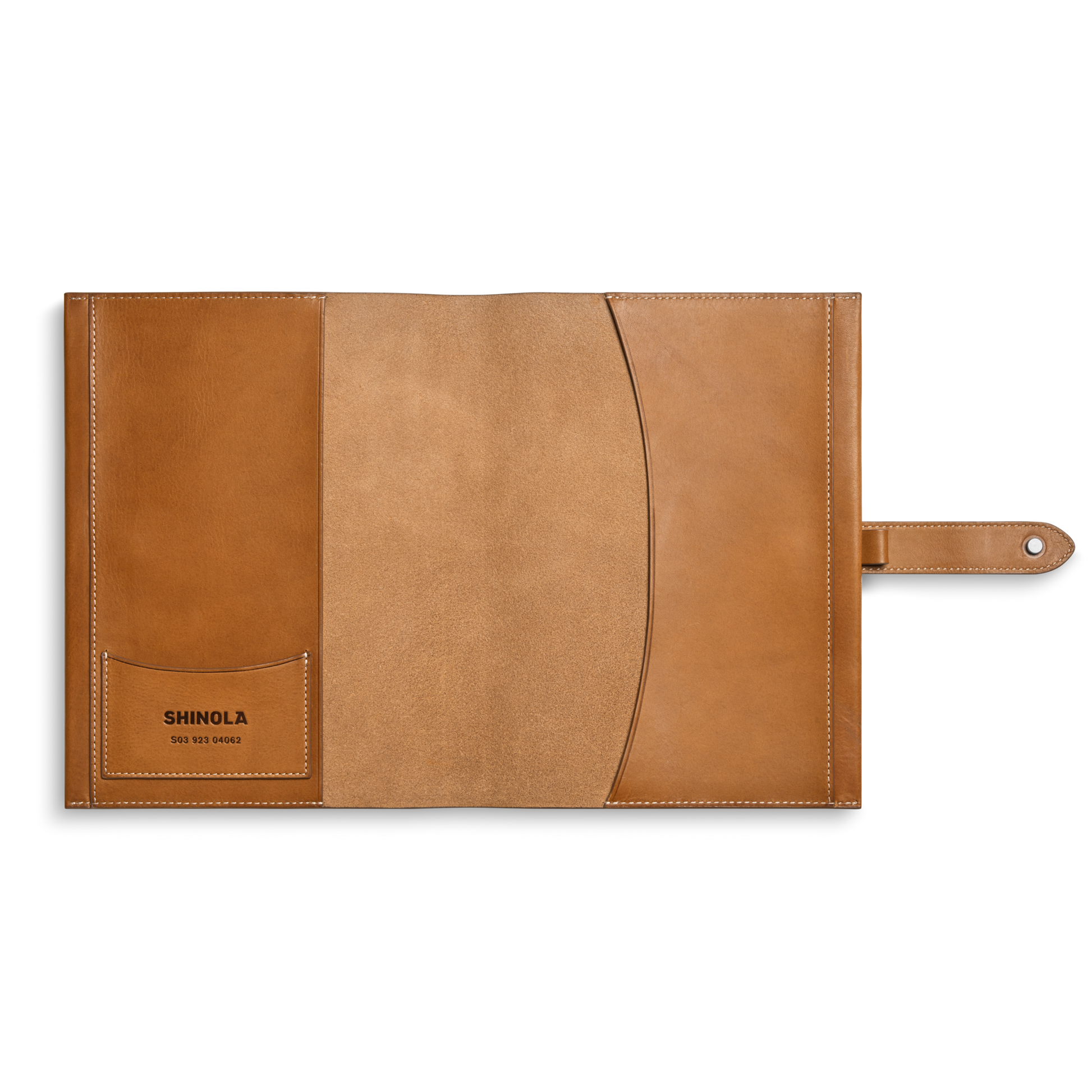 The Shinola Large Journal Cover in tan Italian Vachetta leather features multiple pockets, an open design with a snap tab closure, and the left pocket is embossed with SHINOLA and additional text.