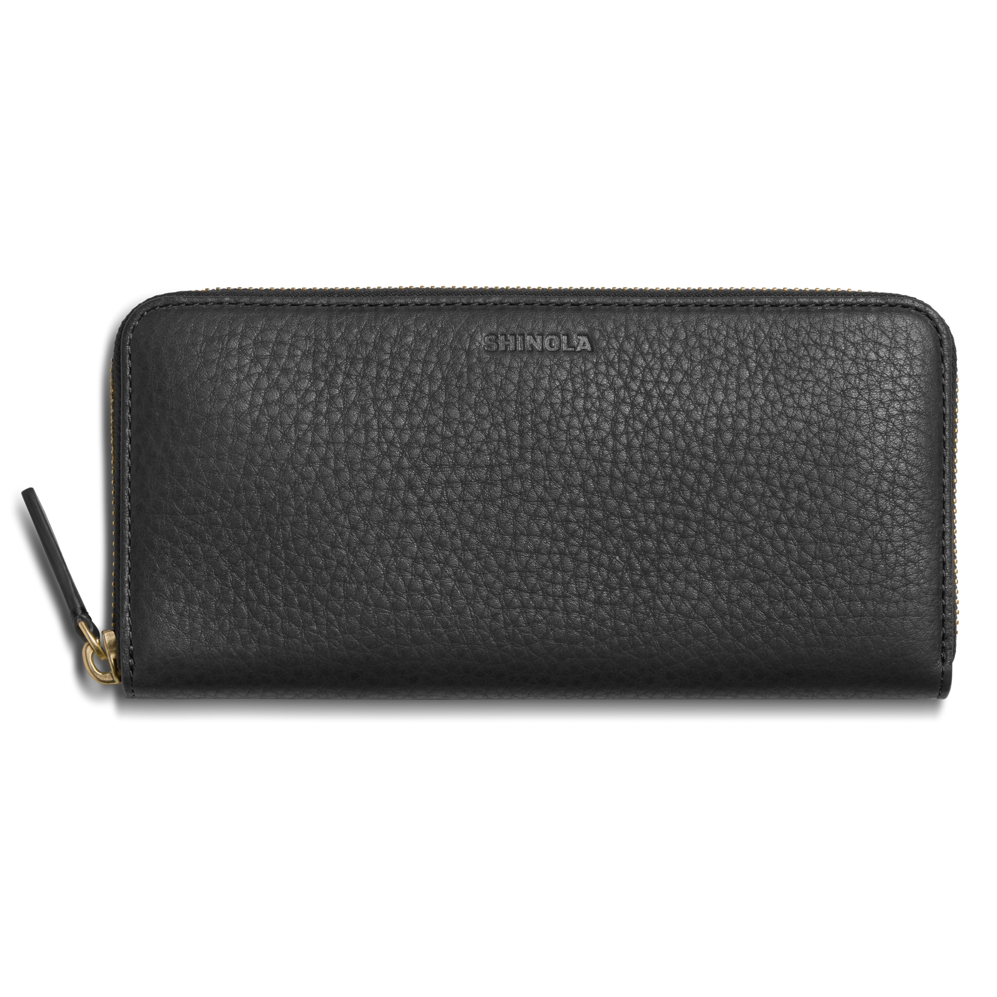 The Shinola Continental Zip Wallet - Black features natural grain leather with a textured finish, gold zipper, interior card pockets, and an embossed Shinola logo near the top center for a refined touch.