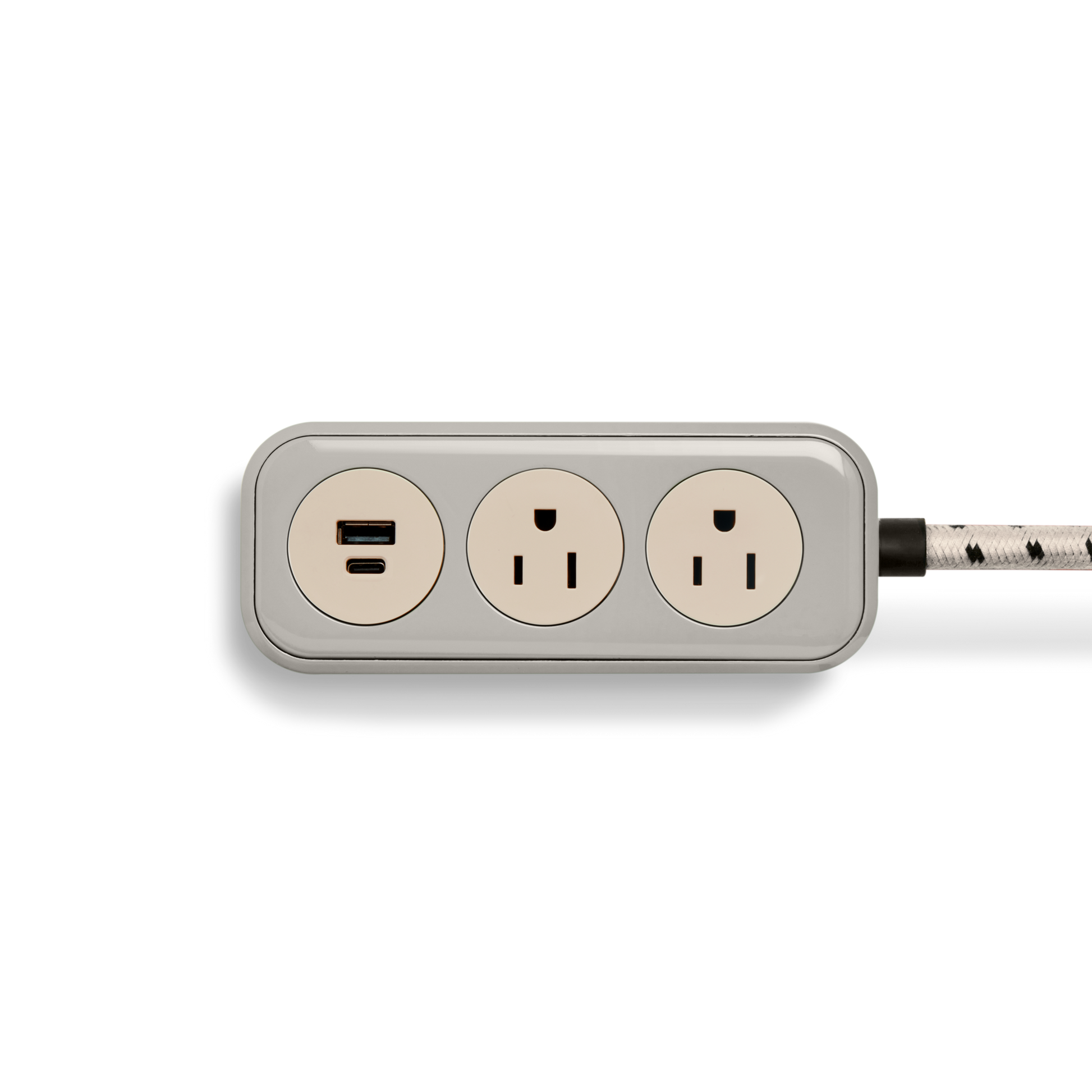 The Shinola 2 Port Power Supply - Stone features two three-prong outlets, one USB port, and a black and white braided extension cord, displayed on a white background.