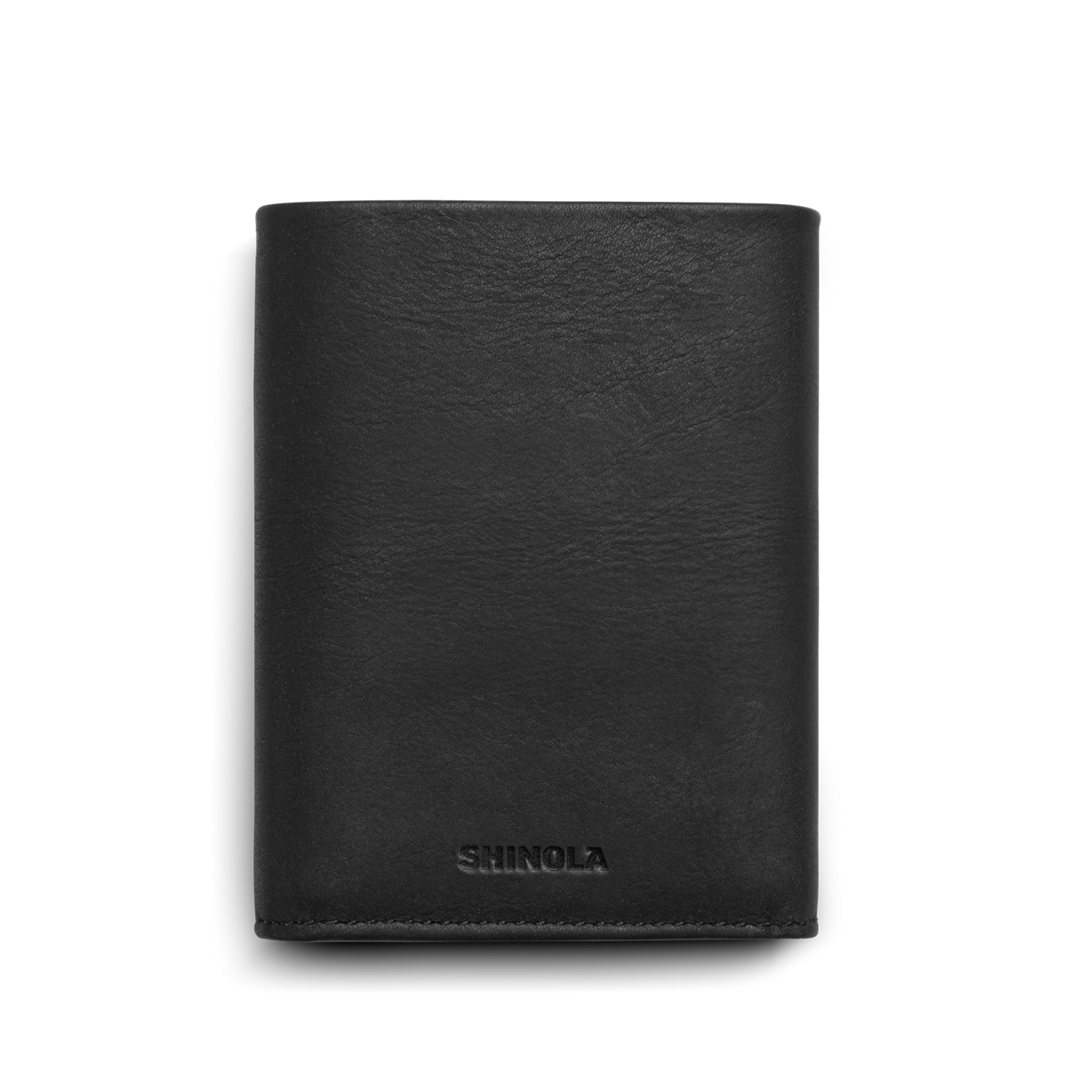 A closed, black Trifold Wallet - Dominos by Shinola, with SHINOLA embossed near the bottom and RFID protection, is photographed against a plain white background.