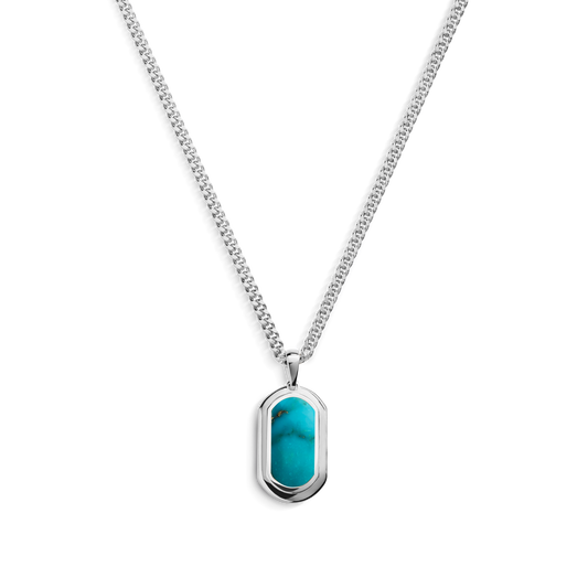 The Shinola Turquoise Inlay Tag Necklace features a rectangular turquoise pendant set in sterling silver, showcased against a white background.