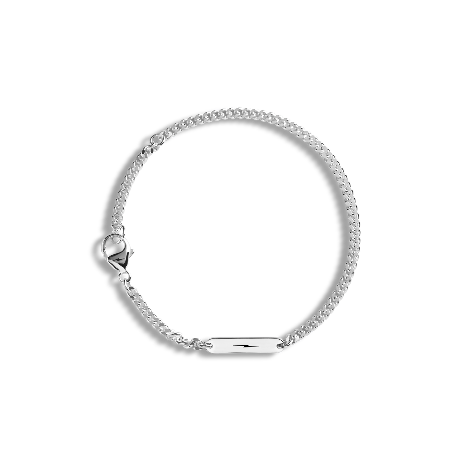 The Shinola 3mm Gauge Chain Bracelet in sterling silver features a sleek curb chain, small rectangular nameplate, and lobster clasp, shown against a plain white background.