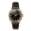 The Shinola Mechanic Watch - Dominos features a gold-tone cushion case, black dial with gold Arabic numerals, black leather strap, single crown, and "MECHANIC" printed above 6 o’clock.