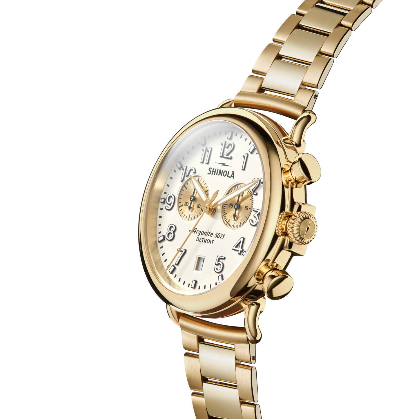 The Shinola Runwell Chronograph Watch - Ivory features a gold stainless steel bracelet, ivory dial, gold hour markers, and two subdials, displayed at an angle on a white background.