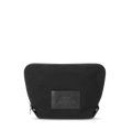 The Large Fold Out Cosmetic Case - Black by Shinola is a cotton canvas toiletry bag with a rectangular leather patch featuring the Shinola Detroit logo, two metal D-rings at the base, and zippered closure—perfect for minimalist travel.