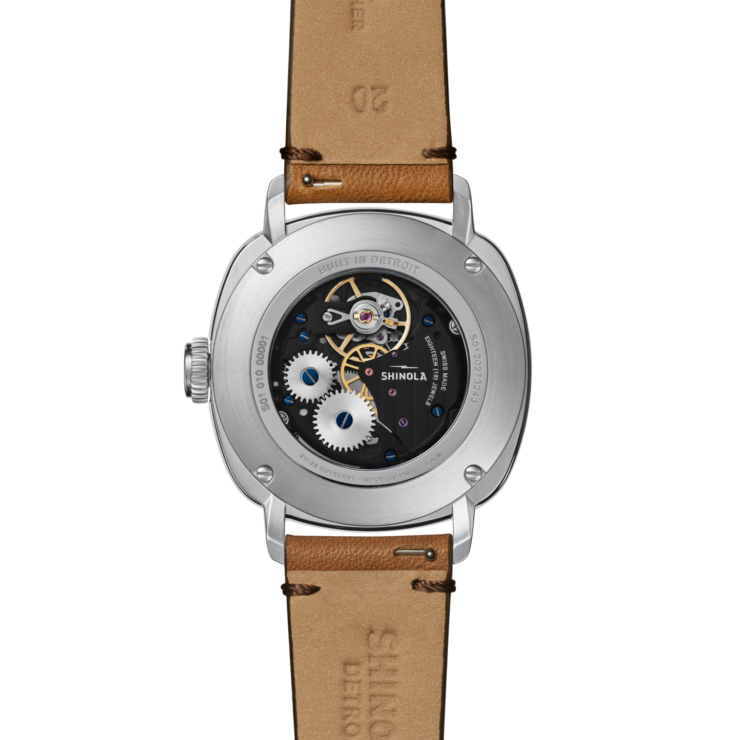 Back view of the Shinola Mechanic Watch - Steel Blue with a brown leather strap, featuring visible gears and manual-wind movement through a transparent case back. “Shinola” is labeled on the internal mechanism.