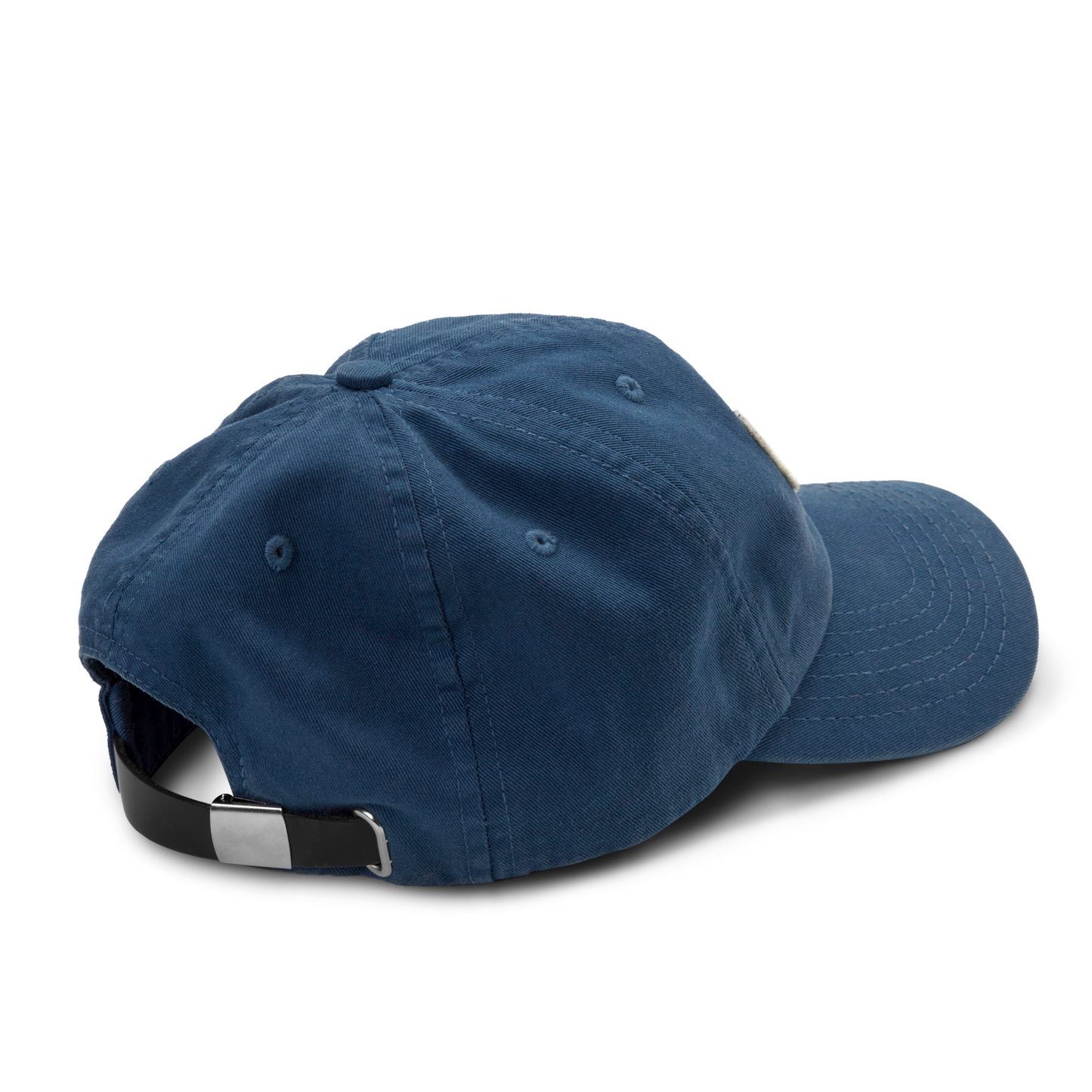 The Shinola Cotton Twill 6 Panel Cap is showcased in blue, with garment-dyed cotton twill and an adjustable black leather strap with a silver clasp, displayed from the back on a plain white background.
