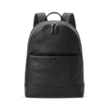 The Shinola Canfield Backpack in black leather features a front zip pocket, dual zipper pulls on the main compartment, and padded shoulder straps—ideal for commuting—shown against a plain white background.