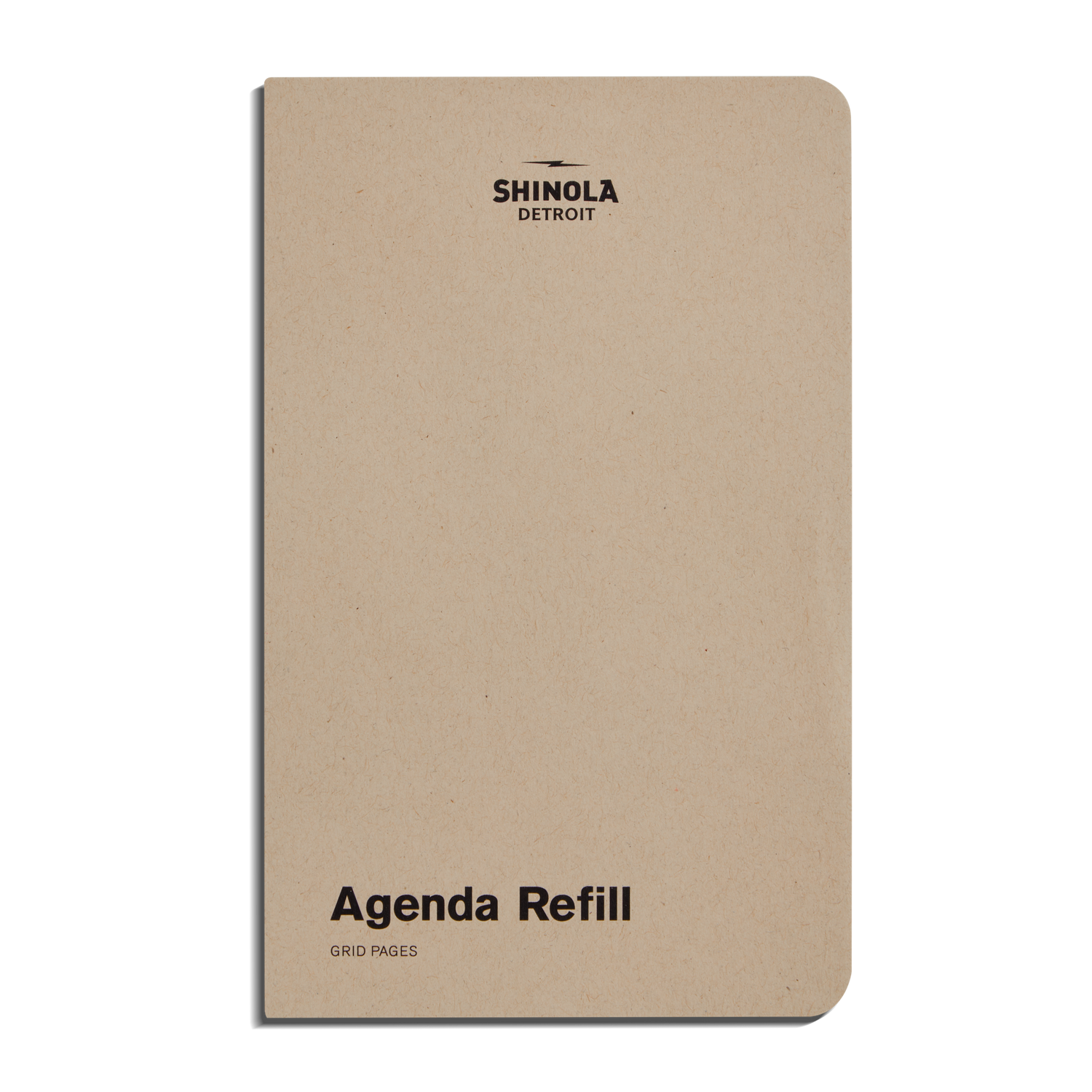 A beige Shinola Grid Agenda Insert - Kraft with rounded corners, made for your Refillable Leather Agenda. The cover shows Shinola at the top and "Agenda Refill with Grid Insert" in black at the bottom.