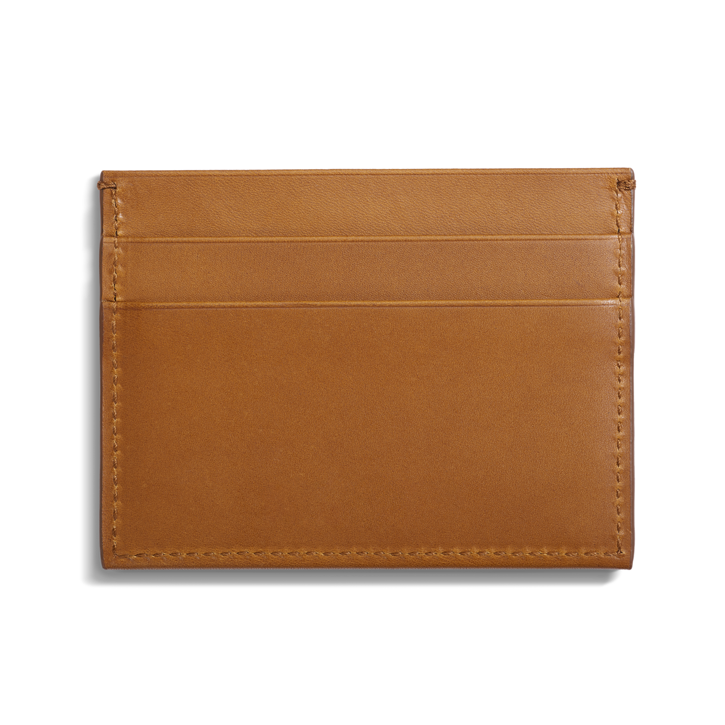 The Shinola 5 Pocket Card Holder in tan vachetta leather features visible edge stitching and multiple card slots, and is displayed against a plain white background.