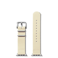 Two Shinola 20mm Cream Split Nylon Apple Watch Straps are shown vertically on a white background. Each strap features silver hardware and multiple adjustment holes for a vintage-inspired look.