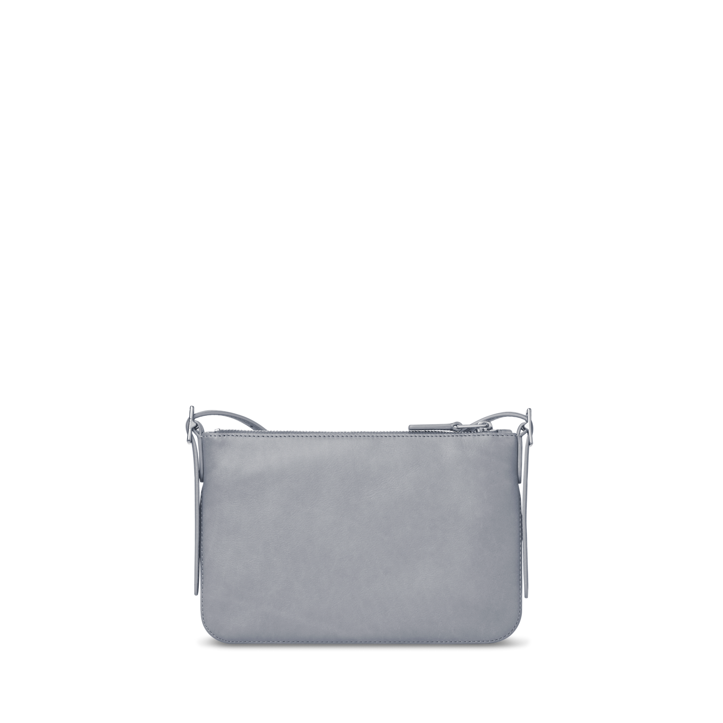The Shinola Small Bixby Crossbody - Mist is a compact, rectangular bag in light gray natural leather with a zip-top and adjustable shoulder strap—an ideal everyday accessory, shown against a plain white background.