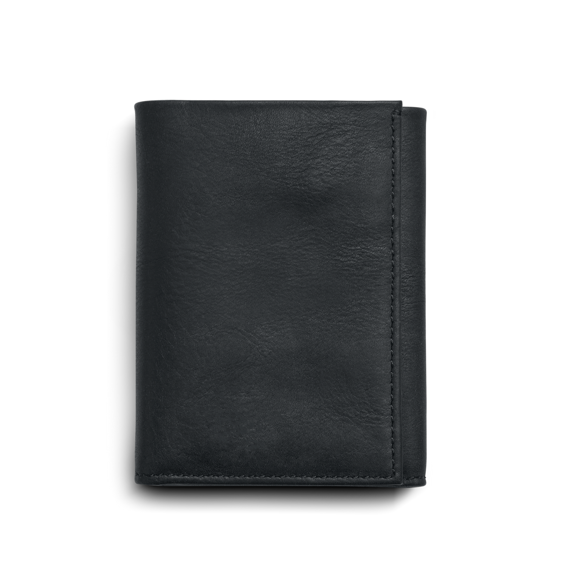 The Shinola Trifold Wallet - Dominos is a closed, black wallet made from Navigator leather, featuring a minimalist design and photographed on a plain white background.