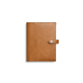 The Shinola Large Journal Cover in tan Italian Vachetta leather features a flap closure with a silver button, shown closed against a plain white background.