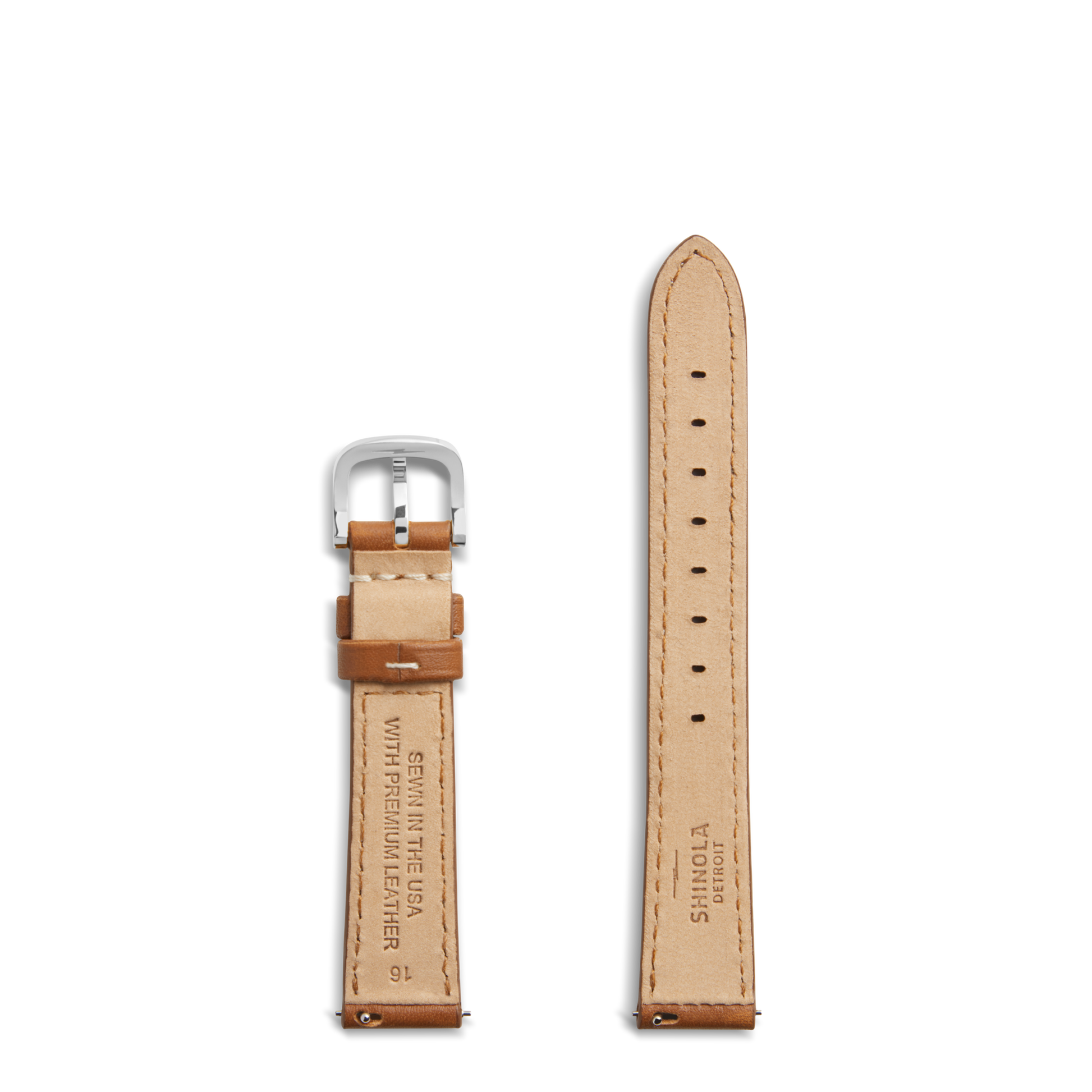 The Shinola 16mm Leather Watch Strap in tan features a silver buckle, multiple adjustment holes, visible stitching, and branded details inside—ideal for those who enjoy customizing their watch.