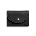 The Shinola Birdy Accordion Card Holder in black, featuring a curved flap and silver snap button, is shown against a light gray background. It offers multiple card pockets for organized storage.