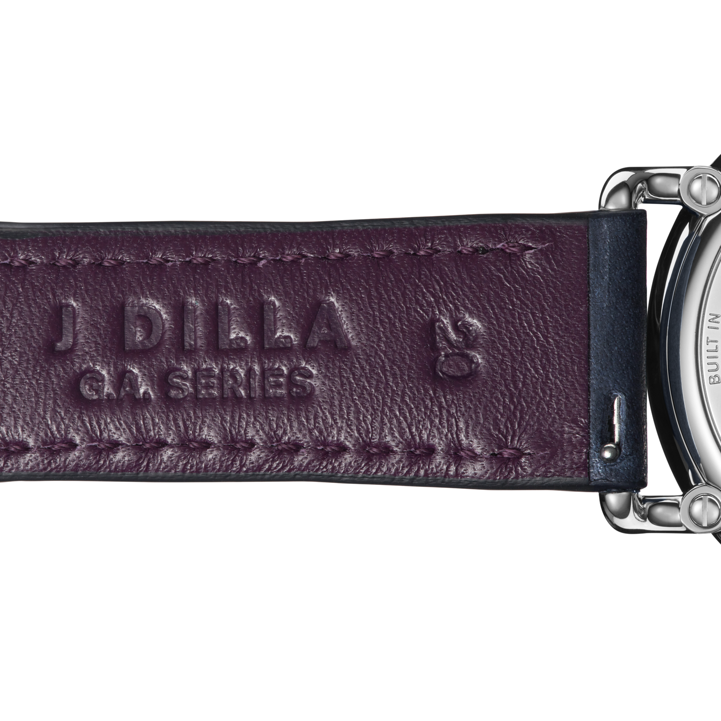 Close-up of a dark purple leather strap embossed with J DILLA GA SERIES and logo, attached to the silver Shinola J Dilla Runwell Chronograph Watch - Midnight Blue.